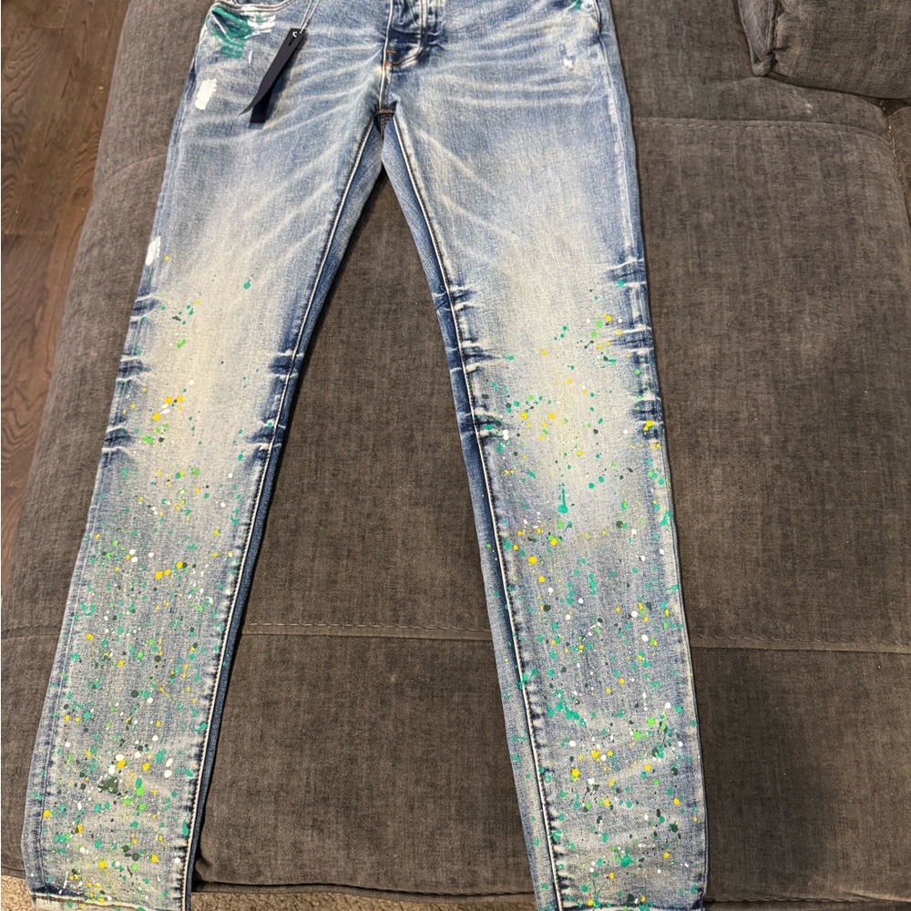 Stylish Blue Jeans with Paint Splatter